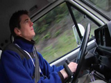Billy driving car.